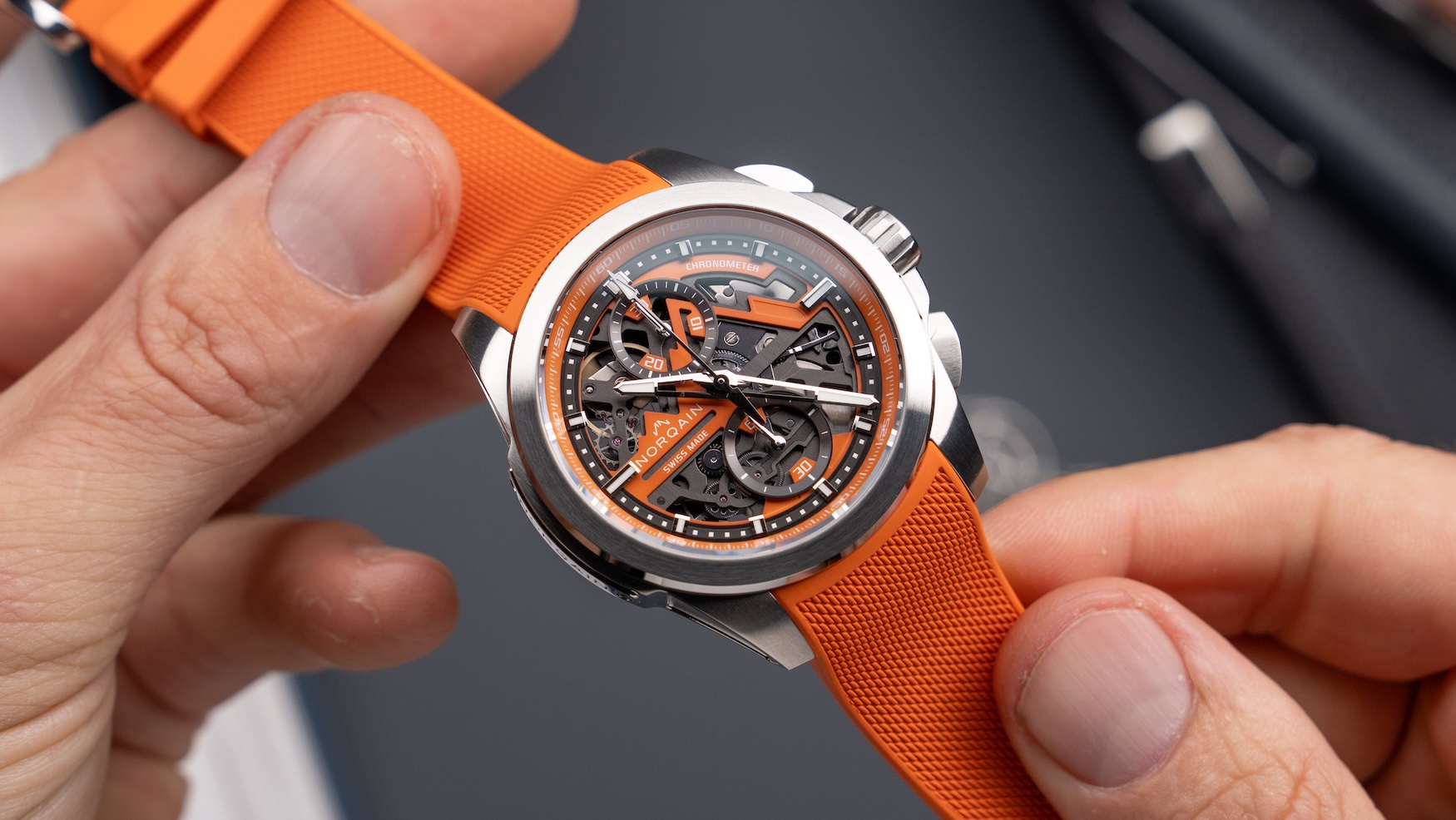 norqain independence skeleton chronograph 42mm orange 5